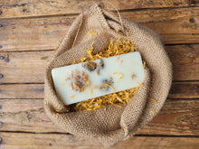 Load image into Gallery viewer, Assorted botanical wax melts with essential oils in various scents, displayed in colorful bars.