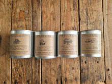 Load image into Gallery viewer, Aluminium tin candles from the South London collection with vintage coin lids and scented notes inspired by Greenwhich Marine, Blackheath Blackberry & Hyacinth, and Woolwich Arsenal