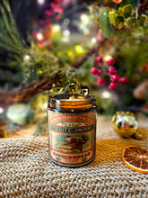 Load image into Gallery viewer, Gingerbread Vintage Vegan Candle in an amber glass jar with a vintage-style illustrated label and gingerbread lettering.