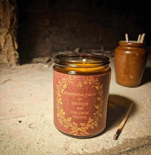Load image into Gallery viewer, Frankincense and Myrrh luxury vegan candle with vintage label on stone surface