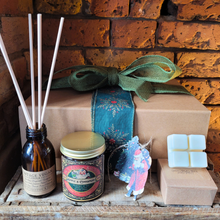 Load image into Gallery viewer, Christmas candle hamper with vintage style candle, mini diffuser, wax melts, and festive decorations in a rustic box with green ribbon