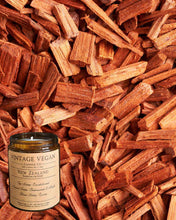 Load image into Gallery viewer, New Zealand Sandalwood soy wax candle with sandalwood, cedarwood, musk, and spice notes in vintage vegan packaging