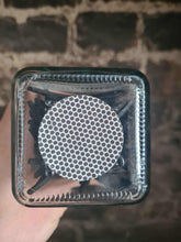 Load image into Gallery viewer, Top view of a personalized glass jar filled with black candle matches and a round strike pad on the bottom