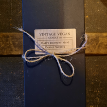 Load image into Gallery viewer, Luxury candle flame snuffer gift box with personalized label and twine bow on dark wooden background