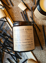 Load image into Gallery viewer, Australia Peppermint and Eucalyptus soy wax vegan candle with vintage label on rustic background