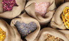 Load image into Gallery viewer, Variety of botanical essential oil wax melts in decorative packaging
