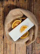 Load image into Gallery viewer, Botanical wax melts with essential oils and botanicals in various scents including lemon, chai, cedarwood, and rose
