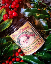 Load image into Gallery viewer, Vintage Christmas Candle with Victorian Santa label surrounded by holly and red berries
